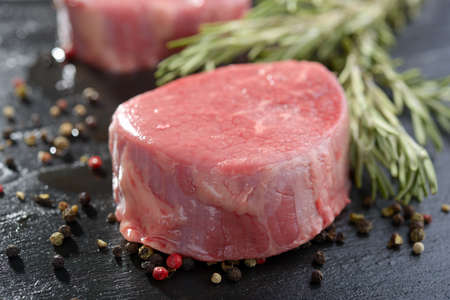 Raw Angus steak and spicesの写真素材