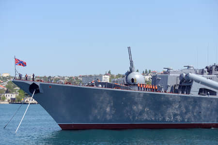 Sevastopol, Russia - May 7, 2013: Crew on the deck of Russian warship Moskva anchored in the harbor of Sevastopol, Ukraine on May 7, 2013 before the naval parade in honor of 230 anniversary of Black Sea navyのeditorial素材