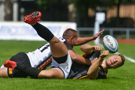 Moscow, Russia - June 29, 2014  Match for place 11 between Romania and Germany  dark shirts  during the FIRA-AER European Grand Prix Series  Germany won 26-12のeditorial素材