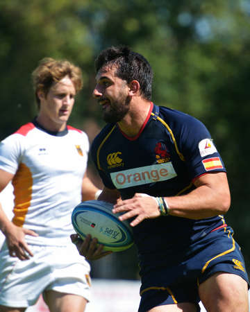 Moscow, Russia - June 29, 2014  Javier de Juan Roldan of Spain with the ball in the semifinal bowl match with Germany during the FIRA-AER European Grand Prix Series  Spain won 22-7のeditorial素材