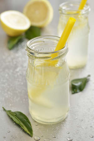 Fresh homemade lemonade in a glass jarの写真素材