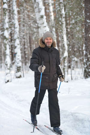 Mature man cross-country skiingの写真素材