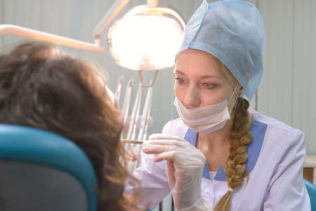 Novosibirsk, Russia - December 4, 2014: Dentist at work in the Health Center. Health Centers are operated since 2010 and aimed to disease preventionのeditorial素材