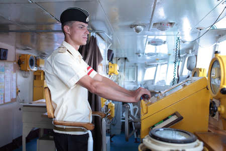 Sevastopol, Crimea, Ukraine - August 17, 2012: Midshipman on the bridge of Russian frigate \"Pytlivy\". Built in Kaliningrad in 1981, the frigate included in the Black Sea Fleet since 1982のeditorial素材