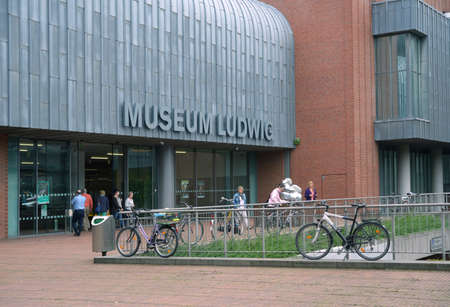 Cologne, Germany - June 30, 2013: People in front of the Museum Ludwig. Emerged in 1976 after the chocolate magnate Peter Ludwig endowed 350 modern artworks, the museum houses a large collection of modern artのeditorial素材