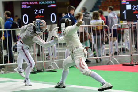 St. Petersburg, Russia - May 1, 2015: Marcus Mepstead of Great Britain vs Roland Schlosser of Austria during the first day of competitions in 41th International fencing tournament St. Petersburg Foil. The tournament is the stage of FIE World Cupのeditorial素材