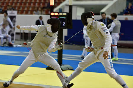 St. Petersburg, Russia - May 1, 2015: Valerio Aspromonte of Italy vs Kyosuke Matsuyama of Japan during the first day of competitions in 41th International fencing tournament St. Petersburg Foil. The tournament is the stage of FIE World Cupのeditorial素材