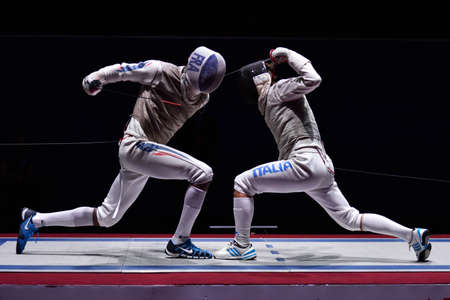 St. Petersburg, Russia - May 3, 2015: Match for 3rd place Italy vs France during 41th International fencing tournament St. Petersburg Foil. The tournament is the stage of FIE World Cupのeditorial素材