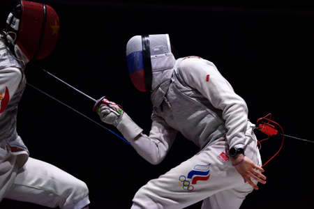 St. Petersburg, Russia - May 3, 2015: Final match Russia vs China during 41th International fencing tournament St. Petersburg Foil. The tournament is the stage of FIE World Cupのeditorial素材
