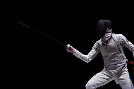 St. Petersburg Russia  May 3 2015: Artur Akhmatkhuzin of Russia in the team final match of 41th International fencing tournament St. Petersburg Foil. The tournament is the stage of FIE World Cupのeditorial素材