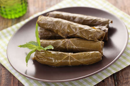 Sarma with mint leaves on a plate