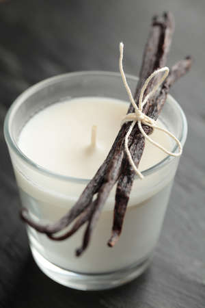 Aromatic candle and vanilla sticks