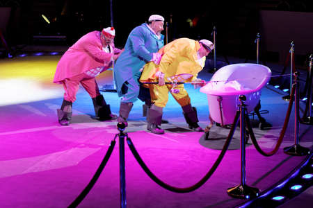 St. Petersburg, Russia - June 2, 2016: Clown group Three Fat Men in the dress rehearsal of the Show of Water, Fire, And Light in the Ciniselli circus. This new show of Anatoly Sokol first time arrived in St. Petersburgのeditorial素材