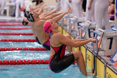 St. Petersburg, Russia - December 17, 2016: Start of mixed gender medley relay 4 x 50 m during X Vladimir Salnikov Cup. Athletes from 6 countries participated in the competitionsのeditorial素材