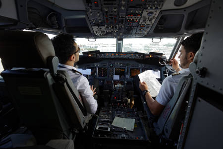 Faro, Portugal - May 13, 2017: Pilots in the cockpit of Ryanair aircraft. Ryanair Has an unblemished 32-year safety recordのeditorial素材