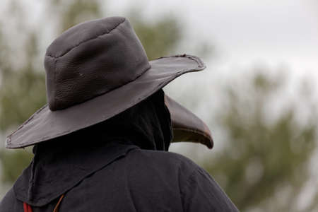 St. Petersburg, Russia - July 8, 2017: Participant in the costume of plague doctor during the military history project Battle On Neva at St. Peter and Paul fortress. Main event this year is the jousting tournamentのeditorial素材