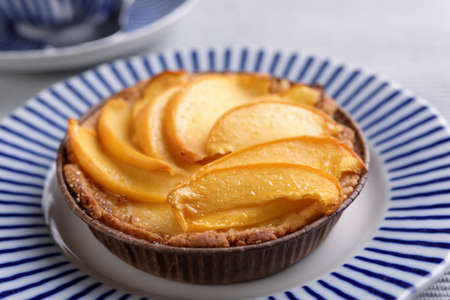 Peach tart on a plate closeup