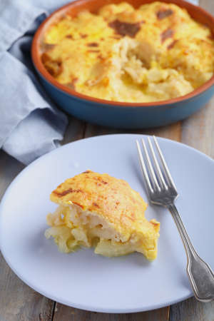 Portion of cauliflower cheese with saffronの写真素材