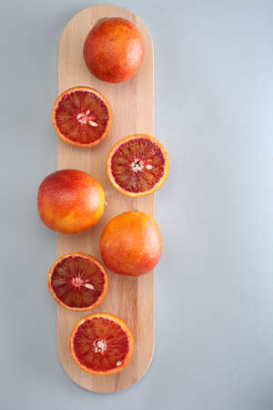 Cara cara navel oranges on a cutting boardの写真素材