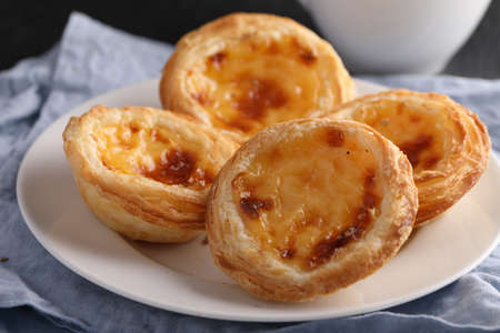 Portuguese egg tart pastry Pastel de nata on a plate