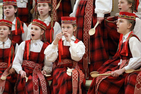 Saint-Petersburg, Russia - February 25, 2018: Children's Choir Lielvarde, Latvia performs during V Children and Youth World Choral Championship. First championship was held in Hong Kong in 2011のeditorial素材