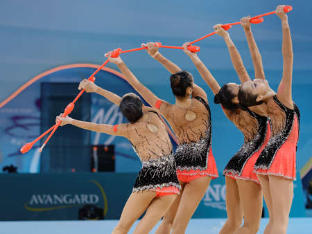 Kiev, Ukraine - August 31, 2013: Team China performs with clubs during 32nd Rhythmic Gymnastics World Championships. The event is held in the Palace of Sportsのeditorial素材