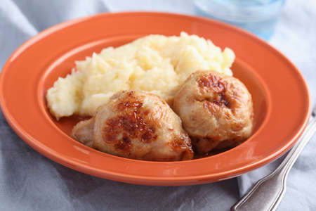 Two chicken galantines with mashed potato closeupの写真素材