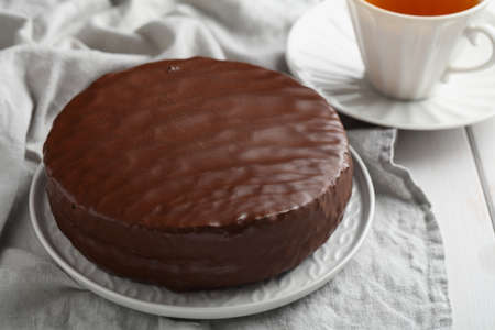 Chocolate cake and a cup of teaの写真素材