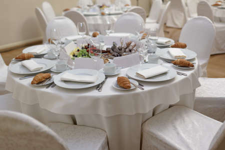 Table with snacks and sweets served for partyの写真素材