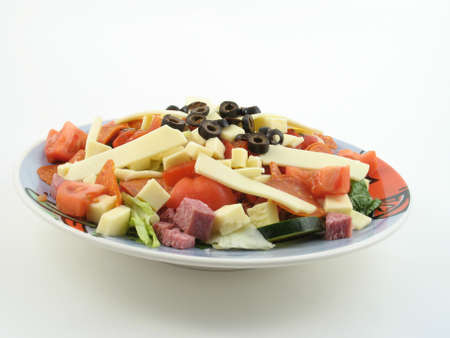 Antipasto salad against a white backgroundの写真素材