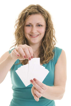 Attractive woman holding blank business fanned cards. Focus on hand and cards.の写真素材