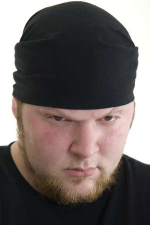 Portrait of an angry looking Caucasian man with a beard