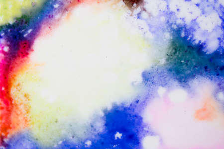Handmade watercolor with blue, orange and yellow. Useable as a background or texture.の写真素材
