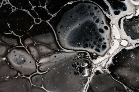 Handmade modern abstract painting. Made with fluid acrylic paints, by acrylic pouring with silicone and torching. Useable as a background or texture.の写真素材