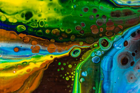 Handmade modern abstract painting. Made with fluid acrylic paints, by acrylic pouring with silicone and torching. Useable as a background or texture.の写真素材