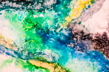 Handmade modern abstract painting. Made with alcohol inks, by using watercolor techniques and rubbing alcohol. Useable as a background or texture.の写真素材