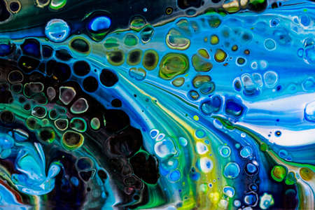Handmade modern abstract painting. Made with fluid acrylic paints, by acrylic pouring with silicone and torching. Useable as a background or texture.の写真素材