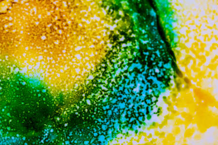 Handmade modern abstract painting. Made with alcohol inks, by using watercolor techniques and rubbing alcohol. Useable as a background or texture.の写真素材