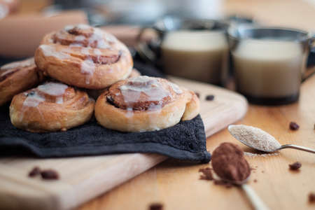 Spiral cinnamon buns on the tableの写真素材