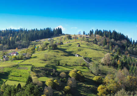 Autumn morning village landscape of Carpathian.の写真素材