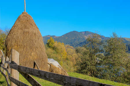 Autumn morning in Carpathian villageの写真素材