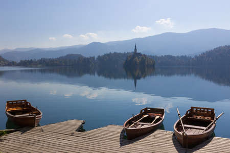 tourist boats on Bled lake in Sloveniaの写真素材
