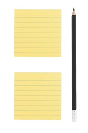 Sharp black pencil and two yellow lined notesの写真素材