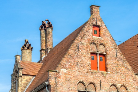 Old brick house in Bruges, Belgiumの写真素材
