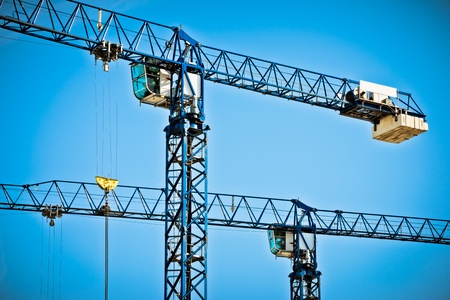 Two cranes and blue skyの写真素材