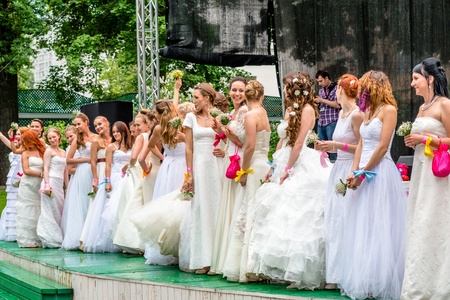 MOSCOW, RUSSIA - 25 MAY: Runaway Brides Cosmopolitan took place in Ermitage Garden. Brides ready to throw wedding bouquets. 25 May, 2013のeditorial素材