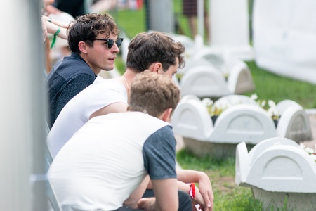 MOSCOW, RUSSIA - 1 JUNE: Tom Burke (Citizens! band) sits in front of the scene while Alt-J band performs on Moscow Ahmad Tea Music Festival. Moscow, 1 June, 2013のeditorial素材