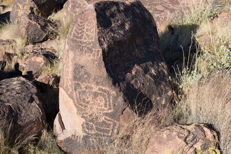 Petroglyphs on the stone in Mojave National Preserveの写真素材