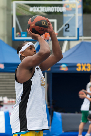 Tallinn, Estonia, August 9, 2014 - Streetball in the center of Tallinn, Estonia. Unidentified player from Cook Season, Finlandのeditorial素材