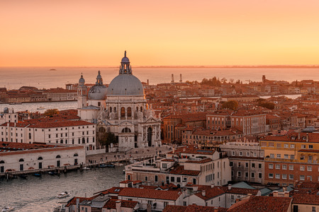 Sunset over Basilica Santa Maria della Salute as viewed from Piazza San Marcoの写真素材